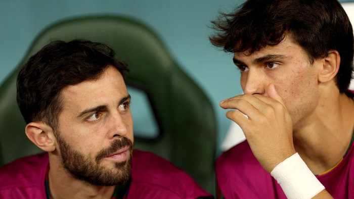AL RAYYAN, QATAR - DECEMBER 02: Bernardo Silva and Joao Felix of Portugal look on from the bench prior to the FIFA World Cup Qatar 2022 Group H match between Korea Republic and Portugal at Education City Stadium on December 02, 2022 in Al Rayyan, Qatar. (Photo by Dean Mouhtaropoulos/Getty Images)