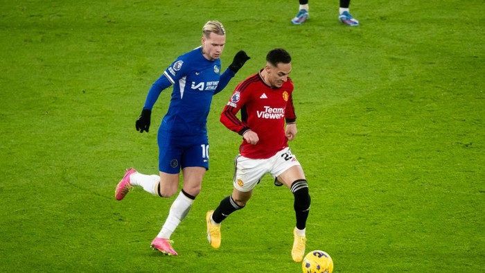MANCHESTER, ENGLAND - DECEMBER 6:  Antony of Manchester United in action during the Premier League match between Manchester United and Chelsea FC at Old Trafford on December 6, 2023 in Manchester, United Kingdom. (Photo by Ash Donelon/Manchester United via Getty Images)