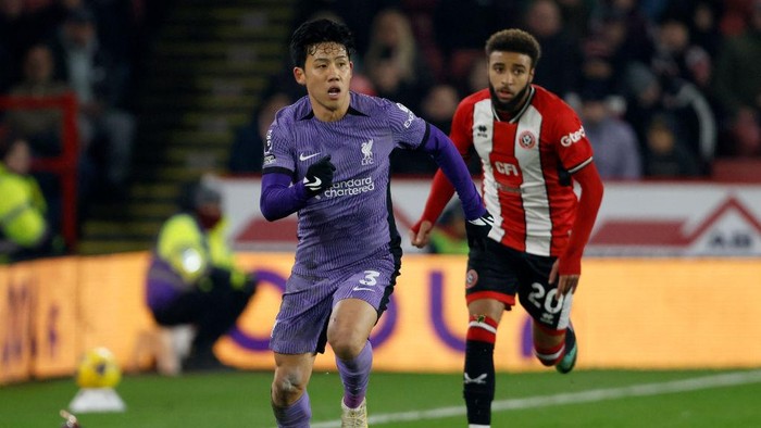 SHEFFIELD, ENGLAND - DECEMBER 6: Wataru Endo of Liverpool and Jayden Bogle of Sheffield United in action during the Premier League match between Sheffield United and Liverpool at Bramhall Lane on December 6, 2023 in Sheffield, England. (Photo by Richard Sellers/Sportsphoto/Allstar via Getty Images)