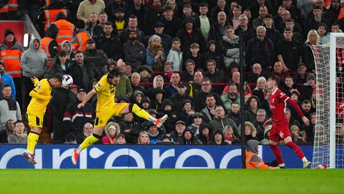 Liverpools Conor Bradley (right) scores an own goal from Sheffield Uniteds Gustavo Hamer (left) during the Premier League match at Anfield, Liverpool. Picture date: Thursday April 4, 2024. (Photo by Peter Byrne/PA Images via Getty Images)