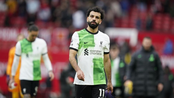 Liverpools Mohamed Salah reacts after the English Premier League soccer match between Manchester United and Liverpool at the Old Trafford stadium in Manchester, England, Sunday, April 7, 2024. (AP Photo/Dave Thompson)