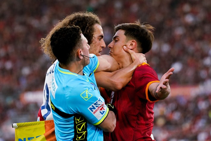 Paulo Dybala of AS Roma argues with Matteo Guendouzi of SS Lazio during the Serie A TIM match between AS Roma and SS Lazio at Stadio Olimpico on April 06, 2024 in Rome, Italy. (Photo by Giuseppe Maffia/NurPhoto via Getty Images)
