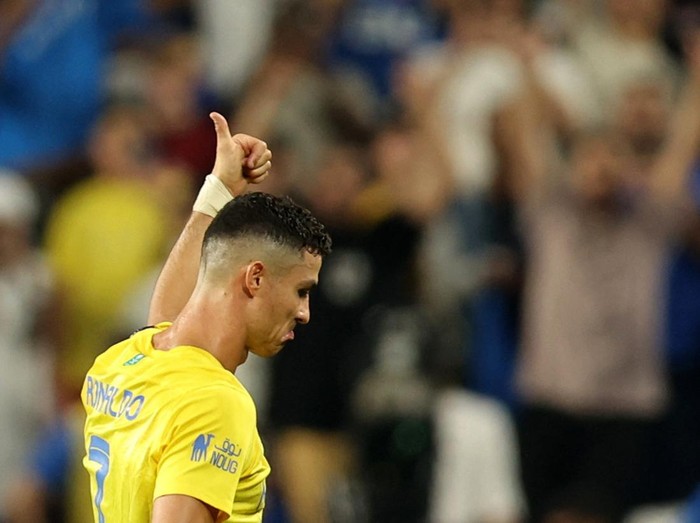 Soccer Football - Saudi Super Cup - Semi Final - Al Hilal v Al Nassr - Mohammed bin Zayed Stadium, Abu Dhabi, United Arab Emirates - April 9, 2024 Al Nassr's Cristiano Ronaldo reacts as he walks off after being shown a red card by referee Mohammed Al Hoaish REUTERS/Stringer