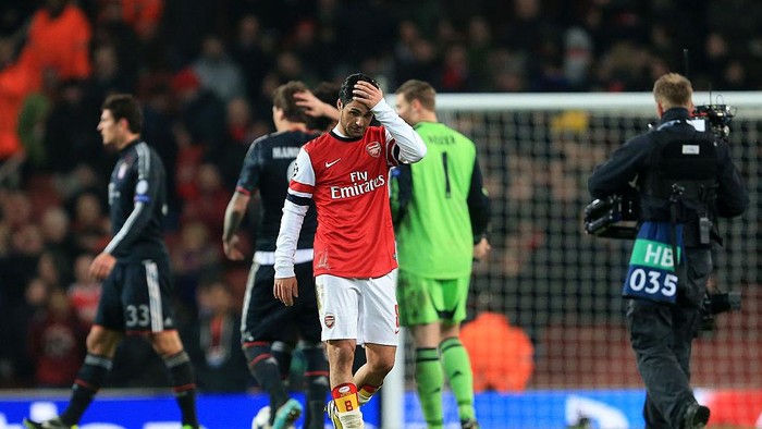 A dejected Mikel Arteta of Arsenal at the end of the match (Photo by AMA/Corbis via Getty Images)