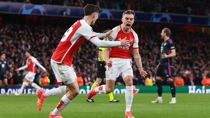 LONDON, ENGLAND - APRIL 9: Leandro Trossard of Arsenal celebrates scoring their 2nd goal during the UEFA Champions League quarter-final first leg match between Arsenal FC and FC Bayern Munchen at Emirates Stadium on April 9, 2024 in London, England.(Photo by Marc Atkins/Getty Images)