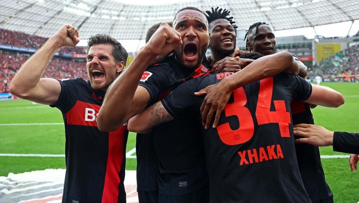 Soccer Football - Bundesliga - Bayer Leverkusen v Werder Bremen - BayArena, Leverkusen, Germany - April 14, 2024
Bayer Leverkusen fans celebrate in the stands REUTERS/Wolfgang Rattay DFL REGULATIONS PROHIBIT ANY USE OF PHOTOGRAPHS AS IMAGE SEQUENCES AND/OR QUASI-VIDEO.     TPX IMAGES OF THE DAY