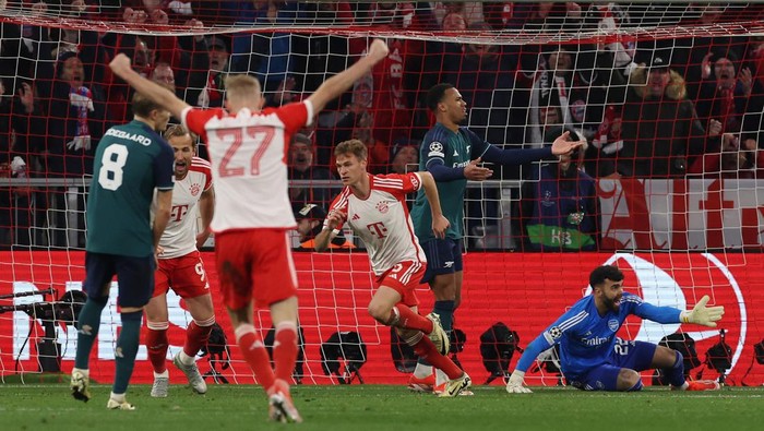 Bayern vs Arsenal MUNICH, GERMANY - APRIL 17: Joshua Kimmich of Bayern Munich celebrates scoring his team's first goal during the UEFA Champions League quarter-final second leg match between FC Bayern MΓΌnchen and Arsenal FC at Allianz Arena on April 17, 2024 in Munich, Germany. (Photo by Alexander Hassenstein/Getty Images)
