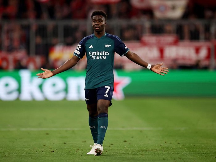 MUNICH, GERMANY - APRIL 17: Bukayo Saka of Arsenal reacts during the UEFA Champions League quarter-final second leg match between FC Bayern München and Arsenal FC at Allianz Arena on April 17, 2024 in Munich, Germany. (Photo by Alex Grimm/Getty Images)