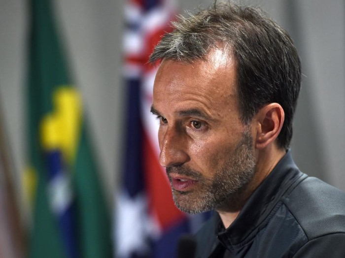 Australian Socceroos football team assistant coach Tony Vidmar speaks after the teams practice match against Brazilian State League side Parana Clube in Vitoria on June 2, 2014, as they prepare for the 2014 FIFA World Cup in Brazil.  AFP PHOTO/William WEST (Photo by WILLIAM WEST / AFP)