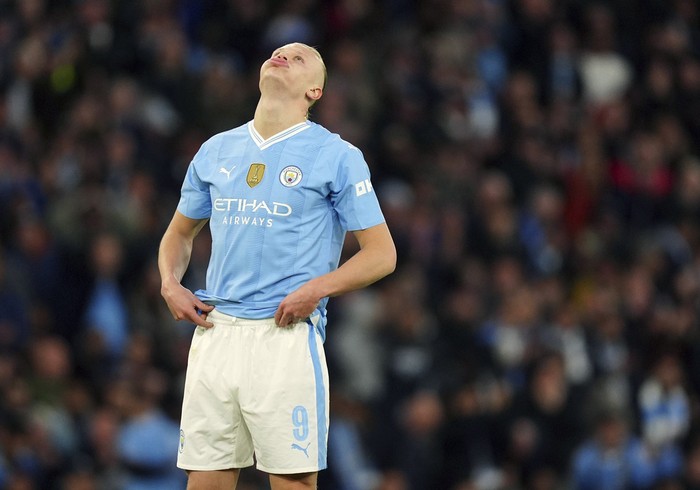 Erling Haaland Manchester City's Erling Haaland reacts to a missed chance at goal, during the Champions League quarterfinal, second leg soccer match between Manchester City and Real Madrid, at the Etihad Stadium, in Manchester, England. Wednesday April 17, 2024. ( Mike Egerton/PA via AP)