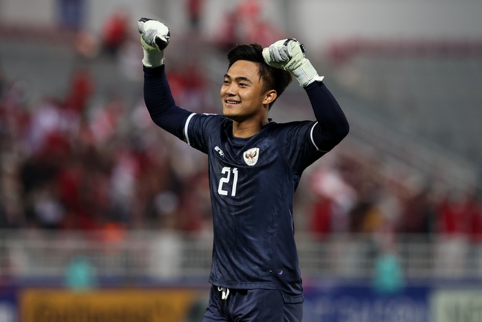 DOHA, QATAR - APRIL 18: Ernando Ari Sutaryadi #21 of Indonesia celebrates the victory after the AFC U23 Asian Cup Group D match between Indonesia and Australia at Abdullah Bin Khalifa Stadium on April 18, 2024 in Doha, Qatar.  (Photo by Zhizhao Wu/Getty Images)