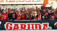 Para pendukung Garuda Muda terlihat memadati Abdullah bin Khalifa Stadium.