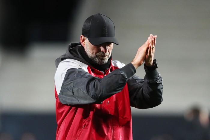BERGAMO, ITALY - APRIL 18: Jurgen Klopp, Manager of Liverpool, applauds the fans following his side's elimination from the UEFA Europa League after the UEFA Europa League 2023/24 Quarter-Final second leg match between Atalanta and Liverpool FC at Stadio Atleti Azzurri d'Italia on April 18, 2024 in Bergamo, Italy. (Photo by Marco Luzzani/Getty Images)