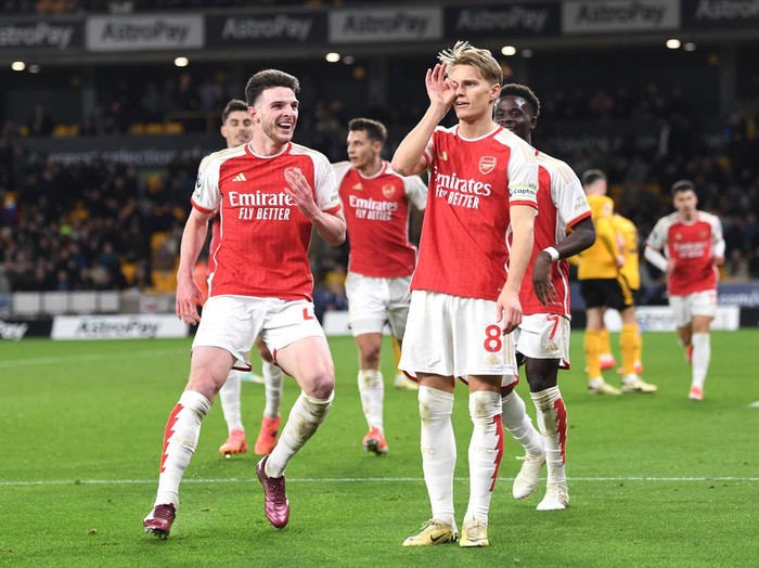 WOLVERHAMPTON, ENGLAND - APRIL 20: Martin Odegaard of Arsenal celebrates scoring his teams second goal during the Premier League match between Wolverhampton Wanderers and Arsenal FC at Molineux on April 20, 2024 in Wolverhampton, England. (Photo by Stuart MacFarlane/Arsenal FC via Getty Images)
