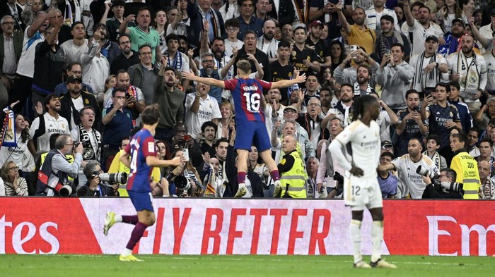 MADRID, SPAIN - APRIL 21: Fermin Lopez of Barcelona celebrates after scoring a goal during the La Liga 32nd week football match between Real Madrid and Barcelona at Santiago Bernabeu Stadium in Madrid, Spain on April 21, 2024. (Photo by Burak Akbulut/Anadolu via Getty Images)