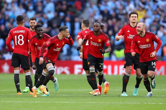 LONDON, ENGLAND - APRIL 21: Antony of Manchester United celebrates as he cups his ear after the teams victory in the penalty shootout during the Emirates FA Cup Semi Final match between Coventry City and Manchester United at Wembley Stadium on April 21, 2024 in London, England. (Photo by Richard Heathcote/Getty Images)