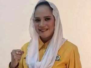 Heboh Foto Kadis Pendidikan Pulau Taliabu Kenakan Atribut Partai Golkar