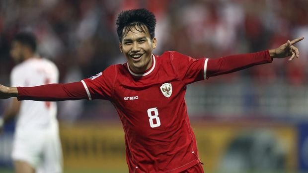 Indonesia's midfielder #08 Witan Sulaeman celebrates after scoring his team's second goal during their AFC U23 Asian Cup Group A match against Jordan at Abdullah Bin Khalifa Stadium in Doha on April 21, 2024. (Photo by KARIM JAAFAR / AFP)