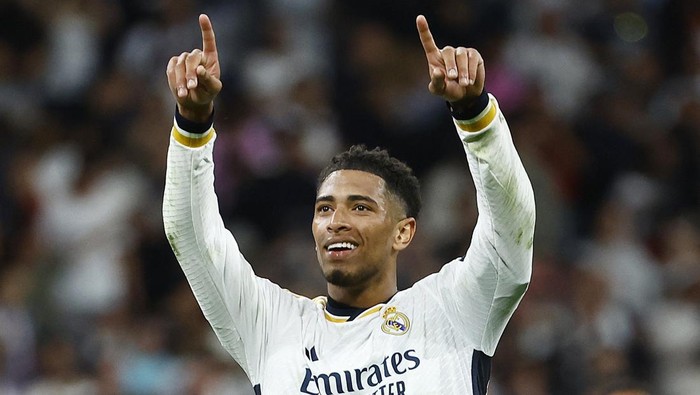 Potret Real Madrid Bungkam Barcelona, Bellingham Jadi Pahlawan Drama lima gol tercipta di El Clasico antara Real Madrid vs Barcelona. Gol Jude Bellingham di masa injury time bikin El Real menang 3-2. Pertandingan dihelat di Santiago Bernabeu, Senin (22/4/2024) dini hari WIB.