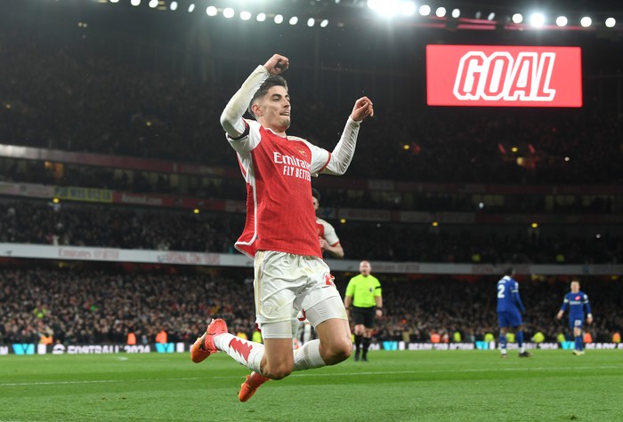 LONDON, ENGLAND - APRIL 23: Kai Havertz of Arsenal celebrates scoring his teams third goal during the Premier League match between Arsenal FC and Chelsea FC at Emirates Stadium on April 23, 2024 in London, England. (Photo by Stuart MacFarlane/Arsenal FC via Getty Images)