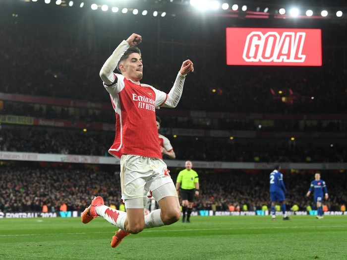 LONDON, ENGLAND - APRIL 23: Kai Havertz of Arsenal celebrates scoring his team's third goal during the Premier League match between Arsenal FC and Chelsea FC at Emirates Stadium on April 23, 2024 in London, England. (Photo by Stuart MacFarlane/Arsenal FC via Getty Images)