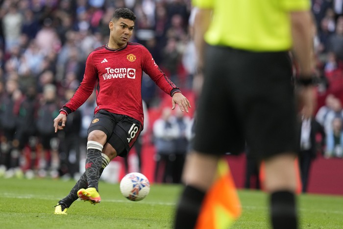 Manchester Uniteds Casemiro kicks the ball during a penalty shootout at the end of the English FA Cup semifinal soccer match between Coventry City and Manchester United at Wembley stadium in London, Sunday, April 21, 2024. (AP Photo/Alastair Grant)