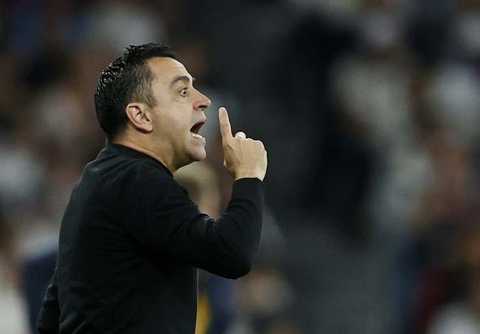 Soccer Football - LaLiga - Real Madrid v FC Barcelona - Santiago Bernabeu, Madrid, Spain - April 21, 2024 FC Barcelona coach Xavi reacts REUTERS/Juan Medina