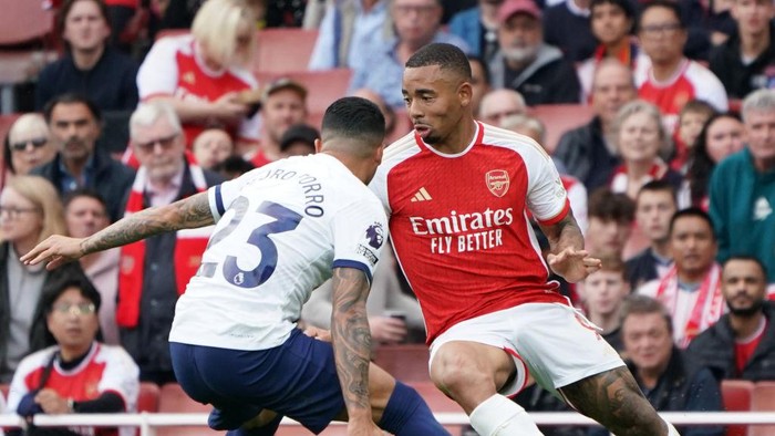 LONDON, ENGLAND - SEPTEMBER 24: Arsenals Gabriel Jesus battles with Tottenhams Pedro Porro
 during the Premier League match between Arsenal FC and Tottenham Hotspur at Emirates Stadium on September 24, 2023 in London, England. (Photo by Stephanie Meek - CameraSport via Getty Images)