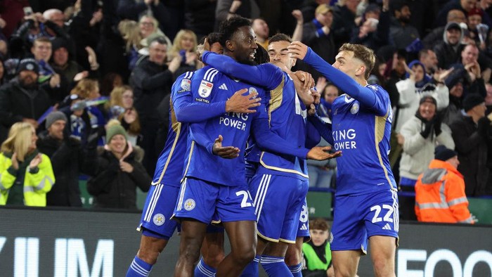 LEICESTER, ENGLAND - APRIL 23:  Leicester Citys Wilfred Ndidi celebrates scoring his sides second goal with team-mate Stephy Mavididi, Harry Winks, Kiernan Dewsbury-Hall  and James Justin  during the Sky Bet Championship match between Leicester City and Southampton FC at The King Power Stadium on April 23, 2024 in Leicester, England.(Photo by Stephen White - CameraSport via Getty Images)