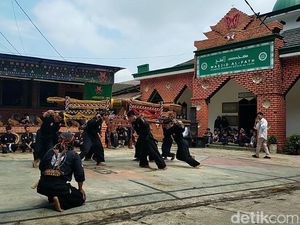 Mengenal Permainan Adu Lisung