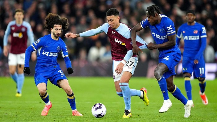 Chelseas Trevoh Chalobah pulls the shirt of Aston Villas Morgan Rogers during the Premier League match at Villa Park, Birmingham. Picture date: Saturday April 27, 2024. (Photo by David Davies/PA Images via Getty Images)