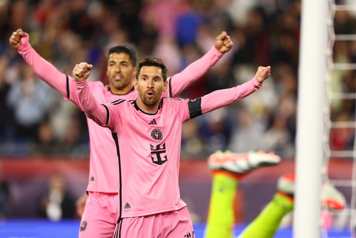 FOXBOROUGH, MASSACHUSETTS - APRIL 27: Luis Suárez #9 and Lionel Messi #10 of Inter Miami celebrate the goal of Benjamin Cremaschi #30 during the second half in the game against the New England Revolution at Gillette Stadium on April 27, 2024 in Foxborough, Massachusetts. (Photo by Maddie Meyer/Getty Images)