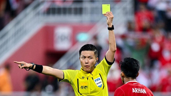 Referee Shen Yinhao from China is reacting during the AFC U23 Asian Cup Qatar 2024 Semi Final match between Indonesia and Uzbekistan at Abdullah Bin Khalifa Stadium in Doha, Qatar, on April 29, 2024. (Photo by Noushad Thekkayil/NurPhoto via Getty Images)