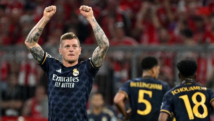 Soccer Football - Champions League - Semi Final - First Leg - Bayern Munich v Real Madrid - Allianz Arena, Munich, Germany - April 30, 2024 Real Madrids Toni Kroos celebrates after Vinicius Junior scores their first goal REUTERS/Angelika Warmuth