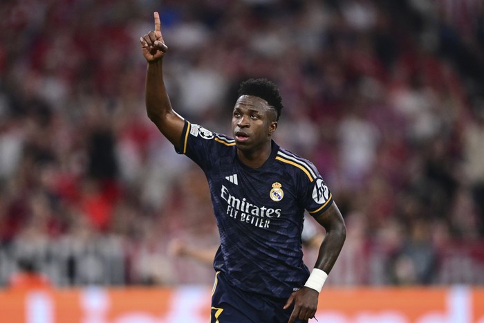 Vinicius Jr Real Madrid's Vinicius Junior celebrates after scoring his side's second goal on a penalty kick during the Champions League semifinal first leg soccer match between Bayern Munich and Real Madrid at the Allianz Arena in Munich, Germany, Tuesday, April 30, 2024. (AP Photo/Christian Bruna)