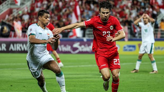 Iraq's midfielder #10 Nihad Mohammed vies for the ball against Indonesia's defender #23 Nathan Tjoe-A-On during the U23 AFC Qatar 2024 Asian Cup third-place match between Iraq and Indonesia at Abdullah Bin Khalifa Stadium in Doha on May 2, 2024. (Photo by Karim JAAFAR / AFP)