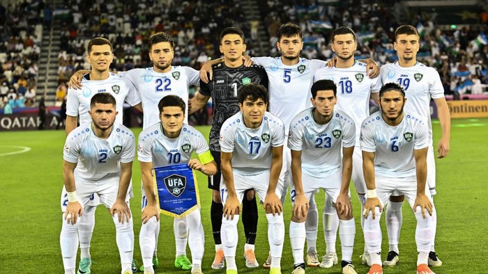 The Uzbekistan team players are posing for a team photo before the AFC U23 Asian Cup Qatar 2024 final match between Japan and Uzbekistan at Jassim Bin Hamad Stadium in Qatar, on May 3, 2024. (Photo by Noushad Thekkayil/NurPhoto via Getty Images)
