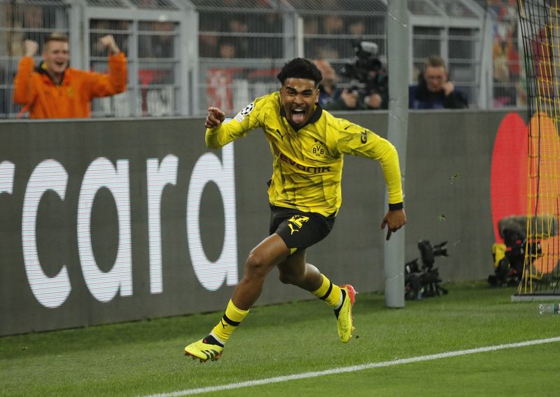 Soccer Football - Champions League - Quarter Final - Second Leg - Borussia Dortmund v Atletico Madrid - Signal Iduna Park, Dortmund, Germany - April 16, 2024  Borussia Dortmund's Ian Maatsen celebrates scoring their second goal REUTERS/Thilo Schmuelgen