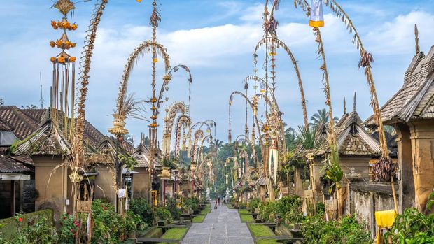 Penglipuran Traditional Village decorated with penjors for Galungan, Bali Indonesia