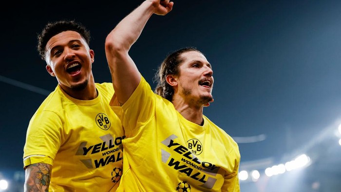 PARIS, FRANCE - MAY 7: Jadon Sancho (L) and Marcel Sabitzer of Dortmund (R) celebrates with his teammates after winning Paris Saint-Germain during the UEFA Champions League semi-final second leg match between Paris Saint-Germain and Borussia Dortmund at Parc des Princes on May 7, 2024 in Paris, France. (Photo by Antonio Borga/Eurasia Sport Images/Getty Images)