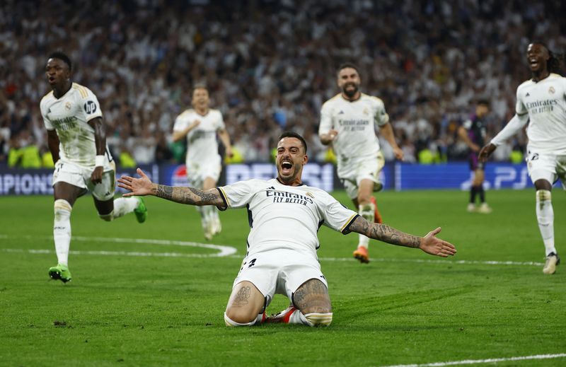 Soccer Football - Champions League - Semi Final - Second Leg - Real Madrid v Bayern Munich - Santiago Bernabeu, Madrid, Spain - May 8, 2024 Real Madrid's Joselu celebrates scoring their second goal REUTERS/Susana Vera