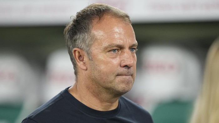 Germany head coach Hansi Flick looks at the field before an international friendly soccer match between Germany and Japan in Wolfsburg, Germany, Saturday, Sept. 9, 2023. (AP Photo/Martin Meissner)