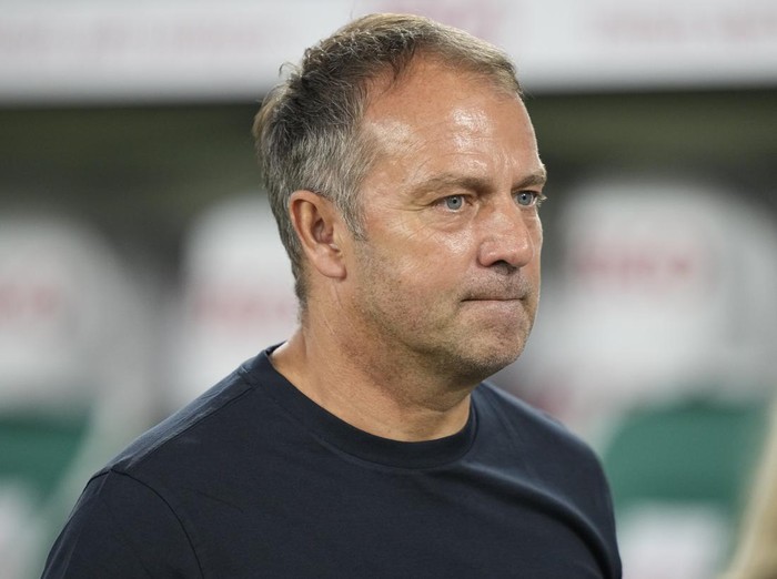 Germany head coach Hansi Flick looks at the field before an international friendly soccer match between Germany and Japan in Wolfsburg, Germany, Saturday, Sept. 9, 2023. (AP Photo/Martin Meissner)