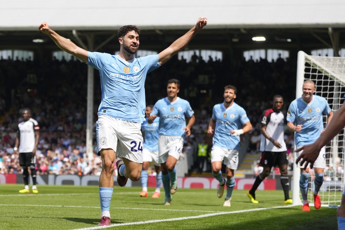 Manchester City's Josko Gvardiol celebrates after scoring his side's third goal during the English Premier League soccer match between Fulham and Manchester City at the Craven Cottage Stadium in London, Saturday, May 11, 2024. (AP Photo/Kirsty Wigglesworth)