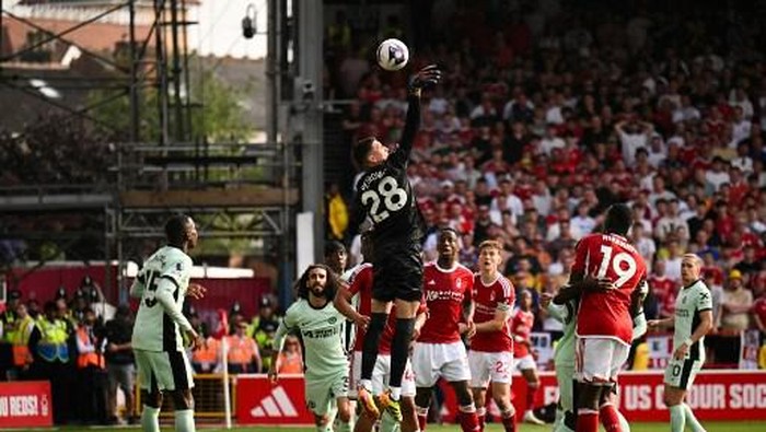 Chelseas Serbian goalkeeper #28 Djordje Petrovic attempts a save during the English Premier League football match between Nottingham Forest and Chelsea at The City Ground in Nottingham, central England, on May 11, 2024. (Photo by Oli SCARFF / AFP) / RESTRICTED TO EDITORIAL USE. No use with unauthorized audio, video, data, fixture lists, club/league logos or live services. Online in-match use limited to 120 images. An additional 40 images may be used in extra time. No video emulation. Social media in-match use limited to 120 images. An additional 40 images may be used in extra time. No use in betting publications, games or single club/league/player publications. /