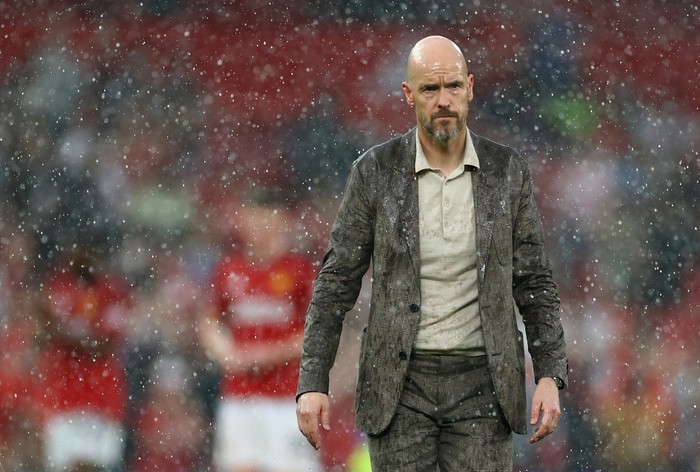 Soccer Football - Premier League - Manchester United v Arsenal - Old Trafford, Manchester, Britain - May 12, 2024 Manchester United manager Erik ten Hag looks on after the match as rain falls REUTERS/Carl Recine EDITORIAL USE ONLY. NO USE WITH UNAUTHORIZED AUDIO, VIDEO, DATA, FIXTURE LISTS, CLUB/LEAGUE LOGOS OR LIVE SERVICES. ONLINE IN-MATCH USE LIMITED TO 120 IMAGES, NO VIDEO EMULATION. NO USE IN BETTING, GAMES OR SINGLE CLUB/LEAGUE/PLAYER PUBLICATIONS. PLEASE CONTACT YOUR ACCOUNT REPRESENTATIVE FOR FURTHER DETAILS..