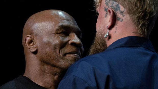 Boxers Mike Tyson and Jake Paul face off during a news conference, ahead of their sanctioned professional fight set to take place at AT&T Stadium in Arlington, Texas on July 20, in New York City, U.S., May 13, 2024. REUTERS/David 'Dee' Delgado