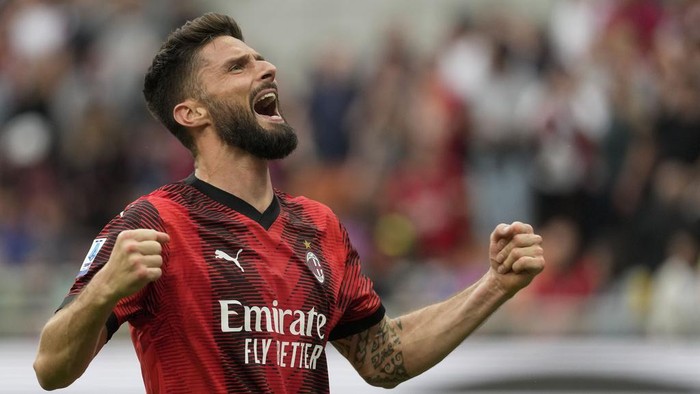 Olivier Giroud AC Milans Olivier Giroud celebrates after scoring his sides third goal during a Serie A soccer match between AC Milan and Genoa, at the San Siro stadium in Milan, Italy, Sunday, May 5, 2024. (AP Photo/Luca Bruno)