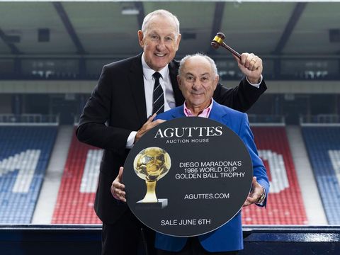 GLASGOW, SCOTLAND - MAY 16: Terry Butcher and Ossie Ardiles promote Aguttes Auction House's sale of Diego Maradona's 1986 Golden Ball Trophy on June 6th in Paris. www.aguttes.com.  (Photo by Craig Foy / SNS Group)
