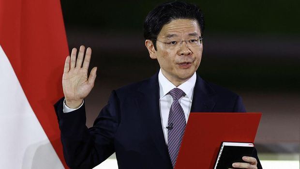 Wakil Perdana Menteri Singapura Lawrence Wong dilantik sebagai Perdana Menteri Keempat Singapura di Istana, di Singapura, 15 Mei 2024. Reuters/Edgar Su/Pool